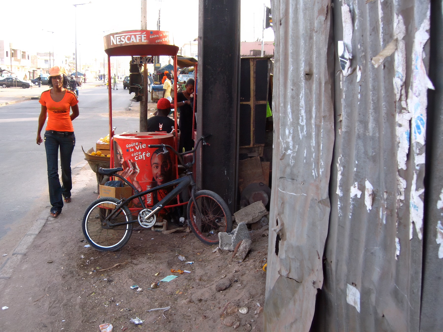 Nescafe street vendor with bicycle, Dakar