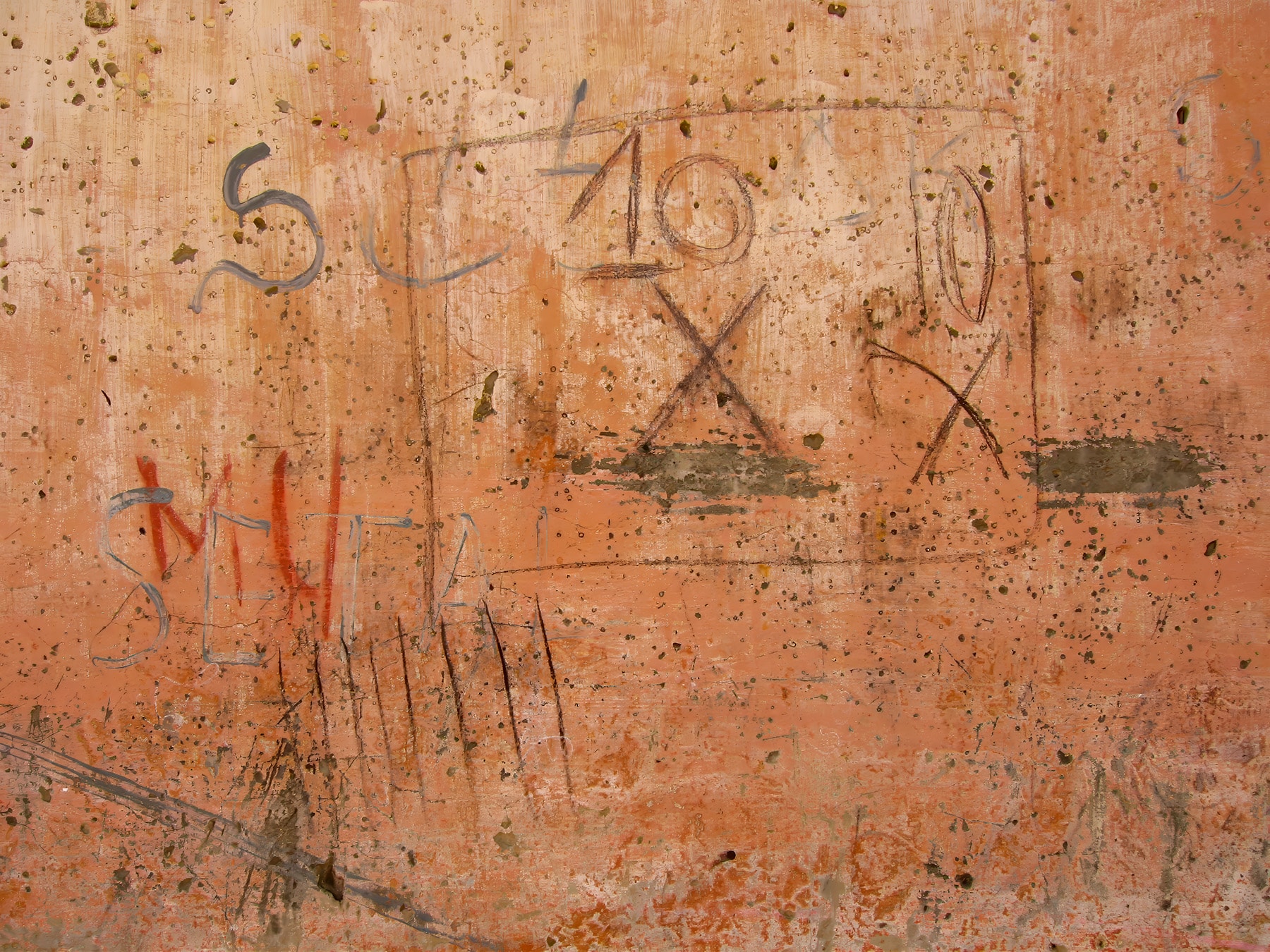 Abstract markings on orange wall, Dakar